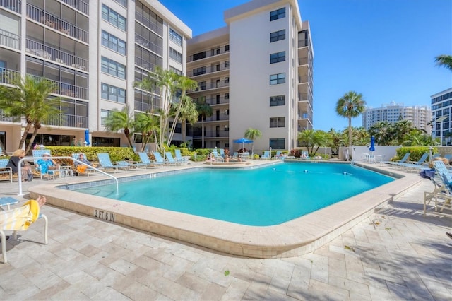 pool with a patio area