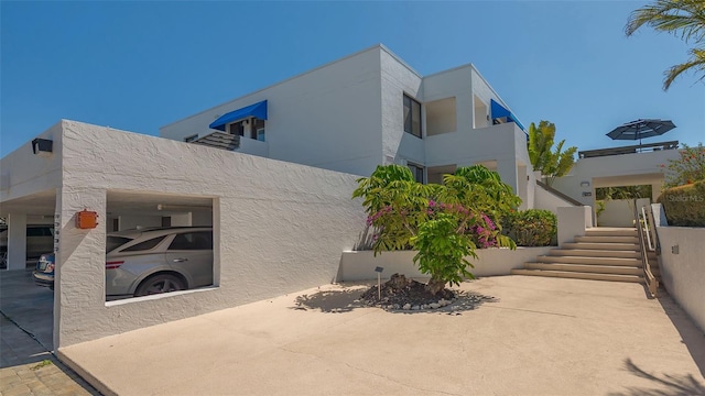 view of home's exterior with stucco siding