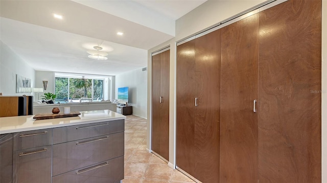 bathroom with tile patterned floors