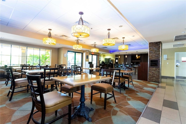 dining room featuring visible vents and baseboards