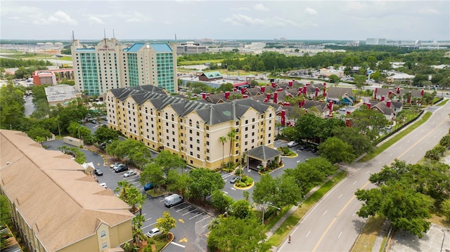 drone / aerial view featuring a city view