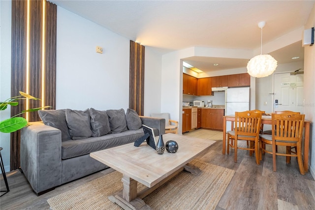 living area featuring light wood-style floors