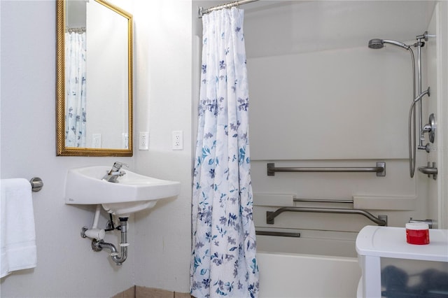 full bath featuring toilet and a sink