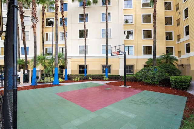 view of sport court featuring community basketball court and fence