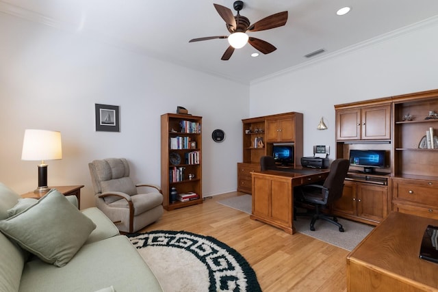 home office featuring light wood finished floors, visible vents, crown molding, recessed lighting, and a ceiling fan