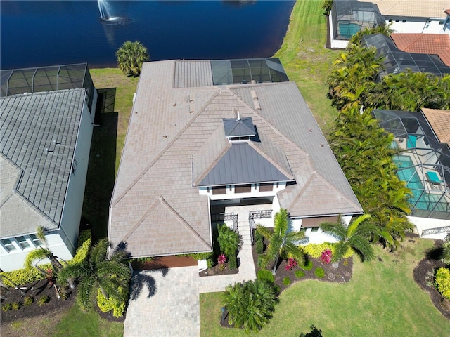 birds eye view of property featuring a water view