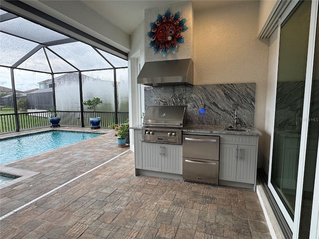 6208 Signature Pointe Ln, Bradenton, FL 34210 - view of patio with a grill, area for grilling, glass enclosure, and a sink