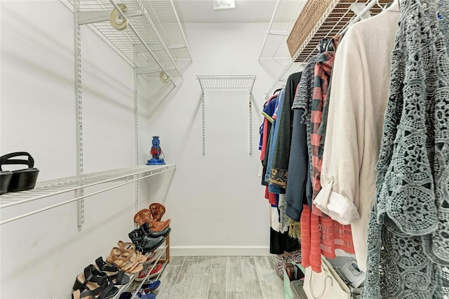 5 Barbados Rd Unit 31, Englewood, FL 34223 - walk in closet featuring wood finished floors