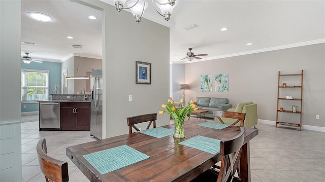 dining area featuring visible vents, baseboards, ornamental molding, light tile patterned floors, and recessed lighting