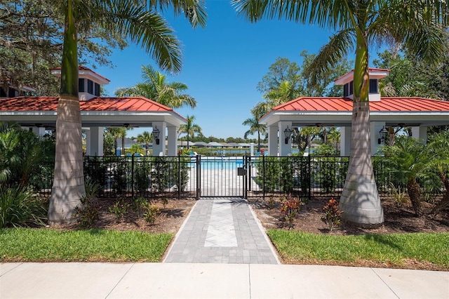 surrounding community featuring a gazebo and fence