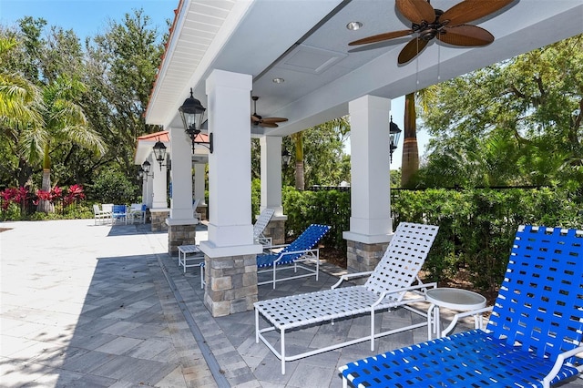 view of patio / terrace featuring outdoor dining area and a ceiling fan