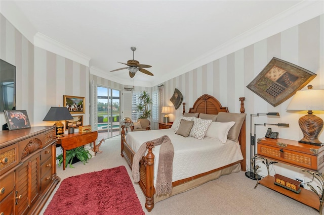 carpeted bedroom with wallpapered walls, access to outside, a ceiling fan, and ornamental molding