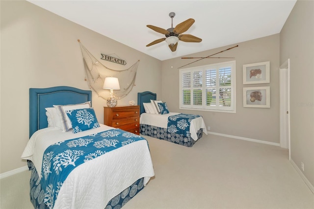 bedroom with baseboards, ceiling fan, and carpet flooring