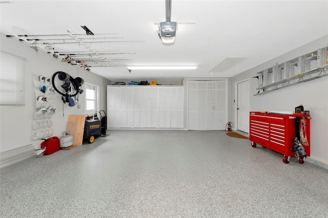 garage featuring a garage door opener