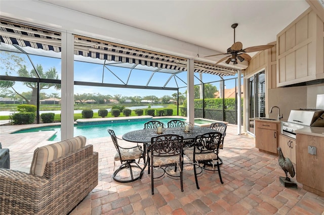 view of patio / terrace featuring glass enclosure, area for grilling, a ceiling fan, and an outdoor pool