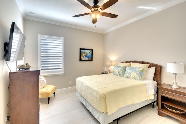 bedroom featuring a ceiling fan, light wood-type flooring, baseboards, and ornamental molding