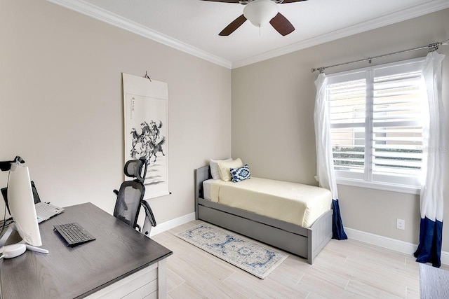 bedroom featuring baseboards, ceiling fan, crown molding, and light wood finished floors