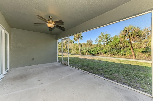 view of patio featuring ceiling fan