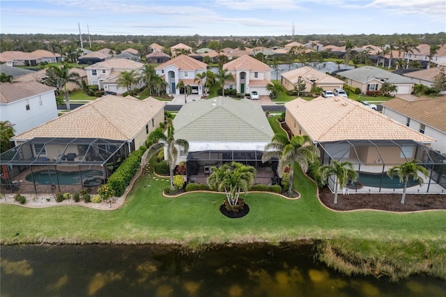 birds eye view of property with a residential view