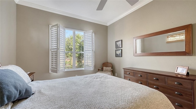 bedroom with ceiling fan and crown molding