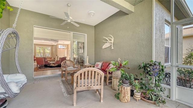 view of patio featuring an outdoor hangout area and ceiling fan