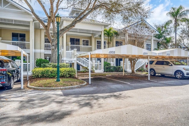 view of property featuring covered parking