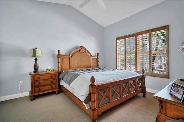 bedroom featuring light carpet, ceiling fan, baseboards, and lofted ceiling