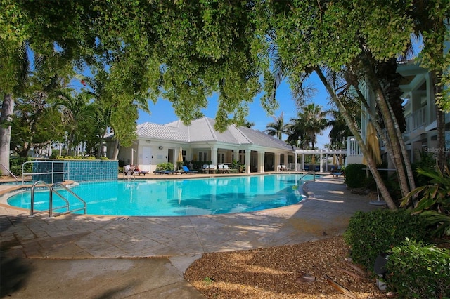 community pool with a patio