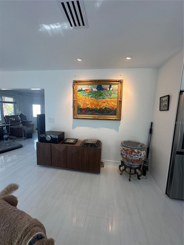 living area featuring recessed lighting