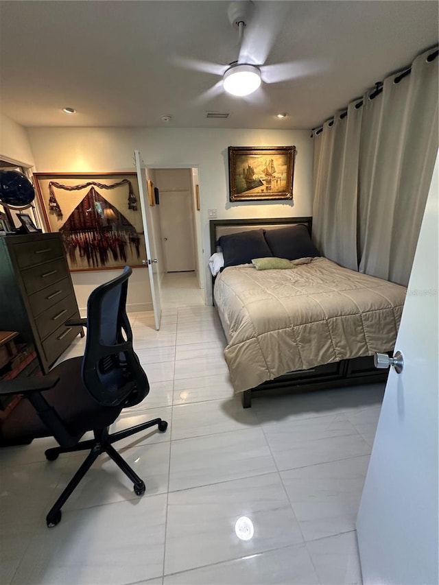 bedroom featuring visible vents and a ceiling fan