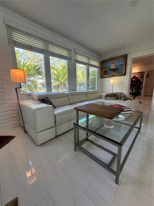 728 41st St, Sarasota, FL 34234 - living area with light marble finish flooring
