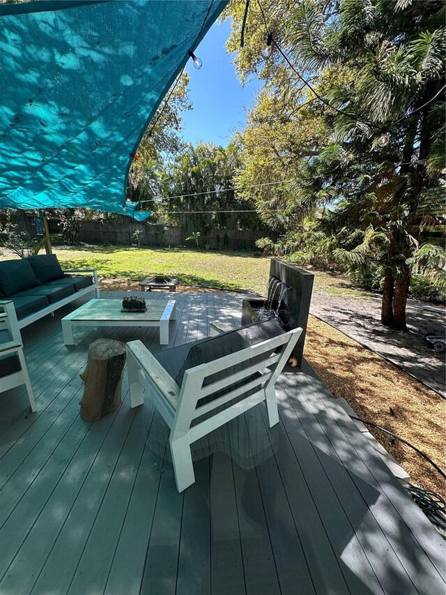 728 41st St, Sarasota, FL 34234 - wooden terrace with an outdoor hangout area