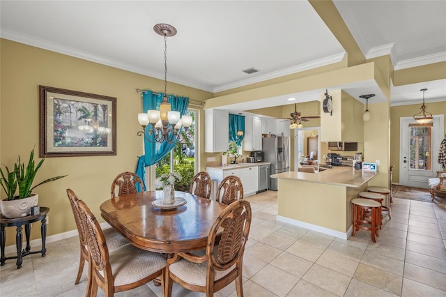 dining area with light tile patterned floors, baseboards, visible vents, crown molding, and ceiling fan with notable chandelier