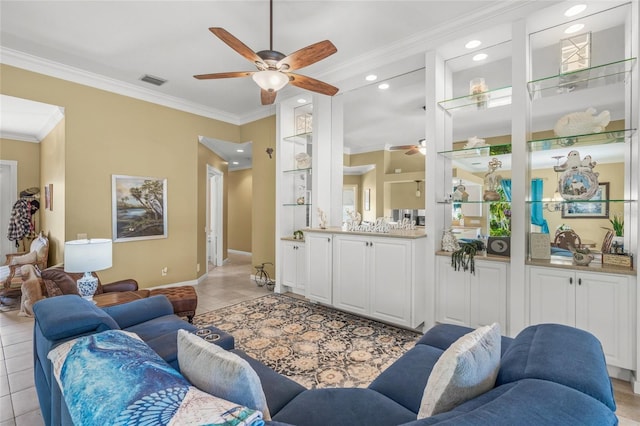 living room featuring visible vents, light tile patterned flooring, recessed lighting, ceiling fan, and crown molding