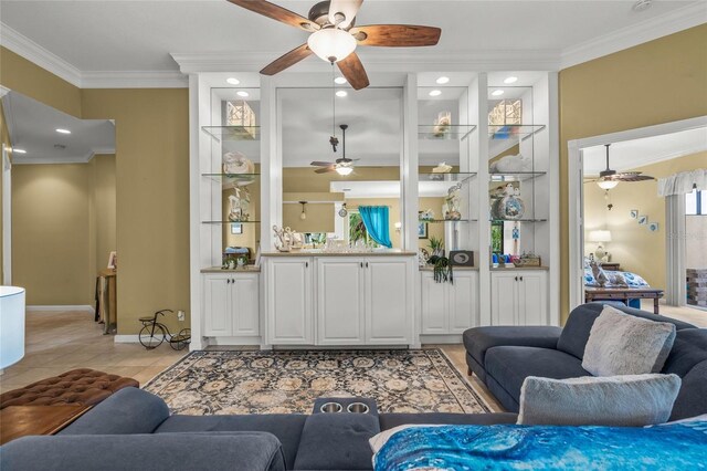 living area with light tile patterned floors, baseboards, recessed lighting, and crown molding