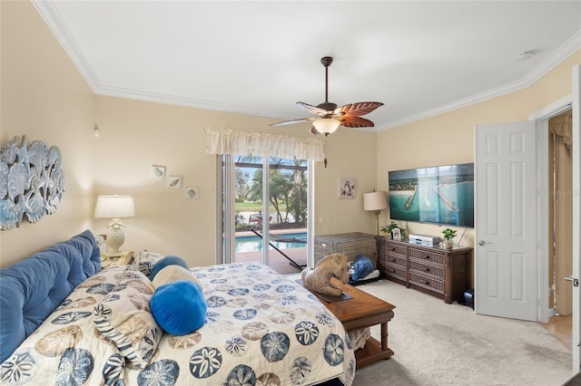 carpeted bedroom with access to exterior, a ceiling fan, and ornamental molding