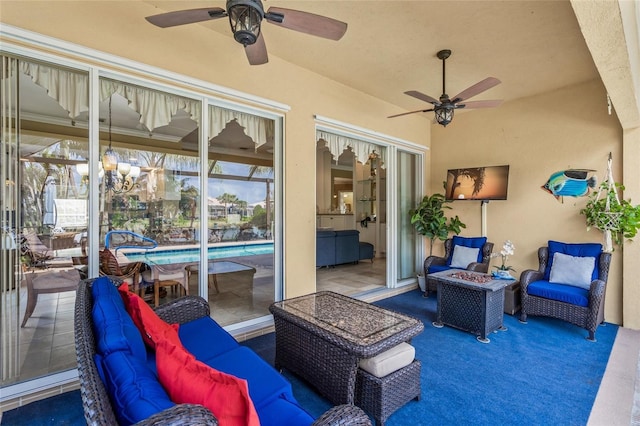 view of patio featuring an outdoor living space with a fire pit