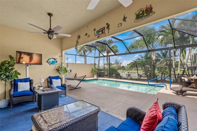 pool featuring a lanai and a patio area