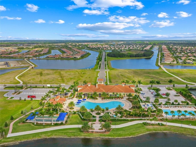 drone / aerial view with a water view