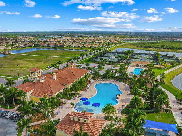 aerial view featuring a residential view and a water view