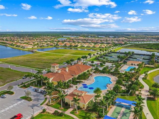 aerial view with a residential view and a water view