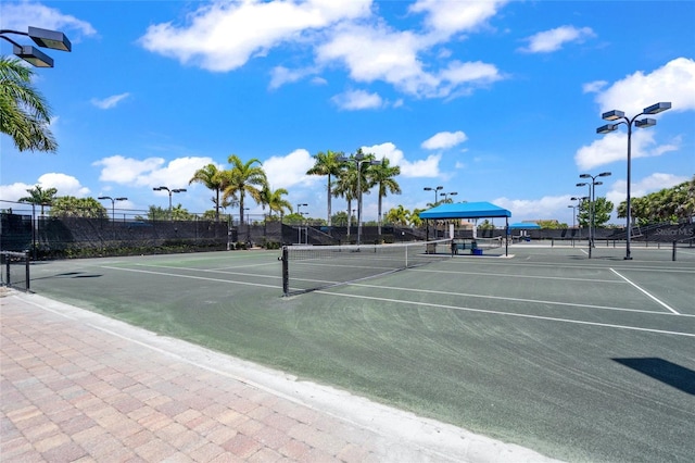 view of sport court with fence