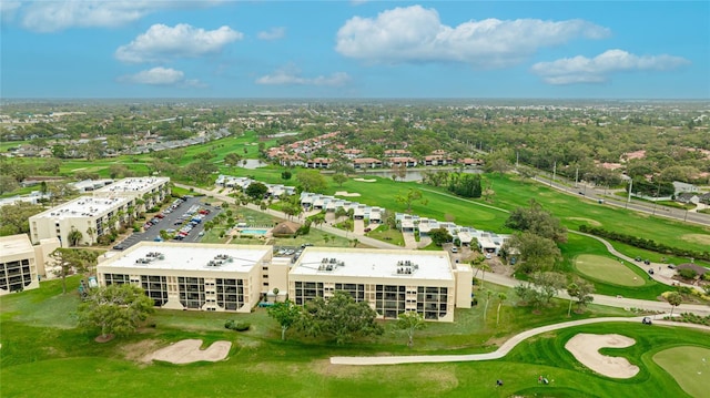 birds eye view of property featuring view of golf course