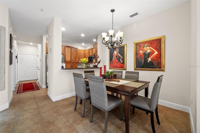 dining room featuring recessed lighting, visible vents, baseboards, and a chandelier