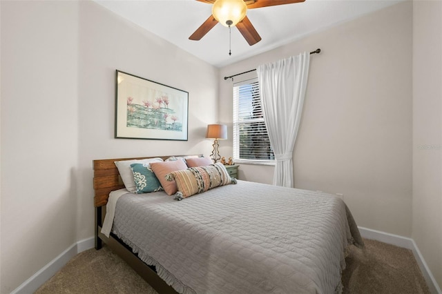 bedroom featuring baseboards, carpet, and a ceiling fan