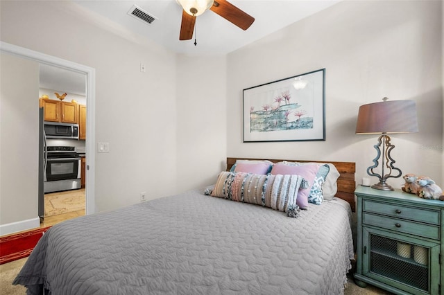 bedroom featuring visible vents and a ceiling fan