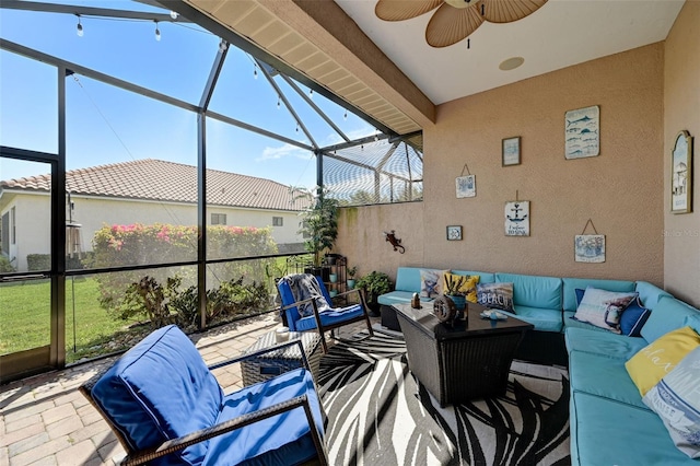 sunroom / solarium with ceiling fan