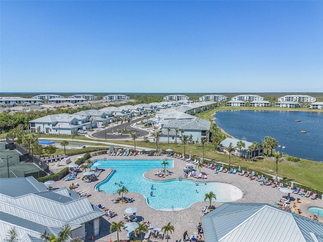 bird's eye view with a water view