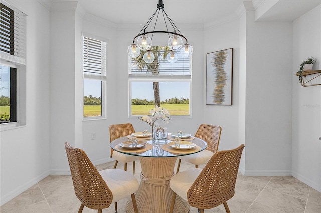 dining space with light tile patterned floors, baseboards, a notable chandelier, and crown molding