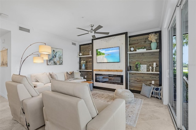 14061 Heritage Landing Blvd Unit 412, Punta Gorda, FL 33955 - living room with ceiling fan and crown molding